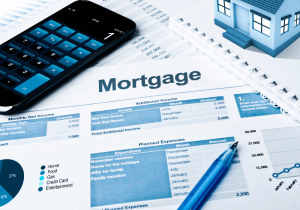 KCP Legal Services Mortgage with Calculator and Pen Mortgage Refinance Blog